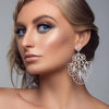 model wearing chandelier earrings